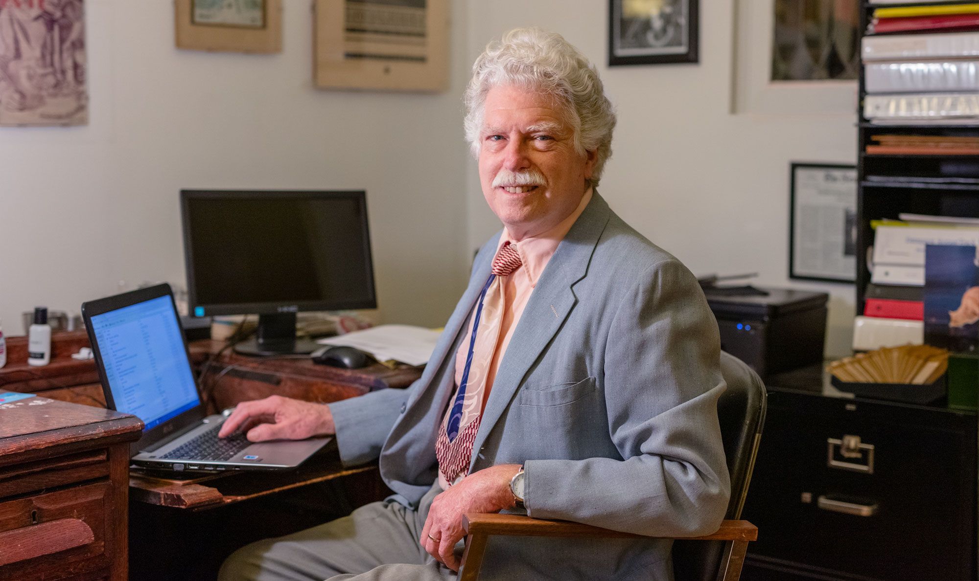 Hal at his desk